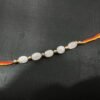 Premium Red Agate Spiritual Rakhi – For Strength, Protection & Positive Energy