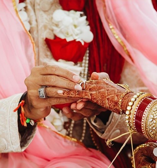 Bride and groom in sacred wedding ritual — guided by marriage numerology by Ruhii Rai, Bhopal numerologist.