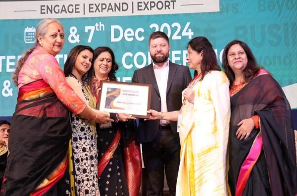Ruhii Rai, leading numerologist in Bhopal, receiving recognition at a national business and export event in December 2024